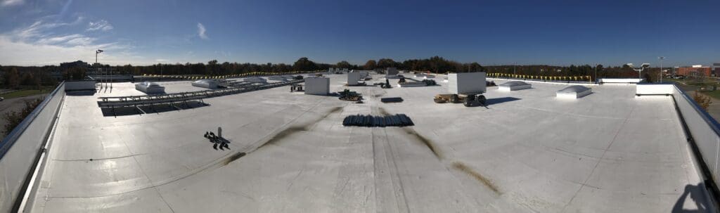 Panoramic photo of a rooftop solar array just getting started